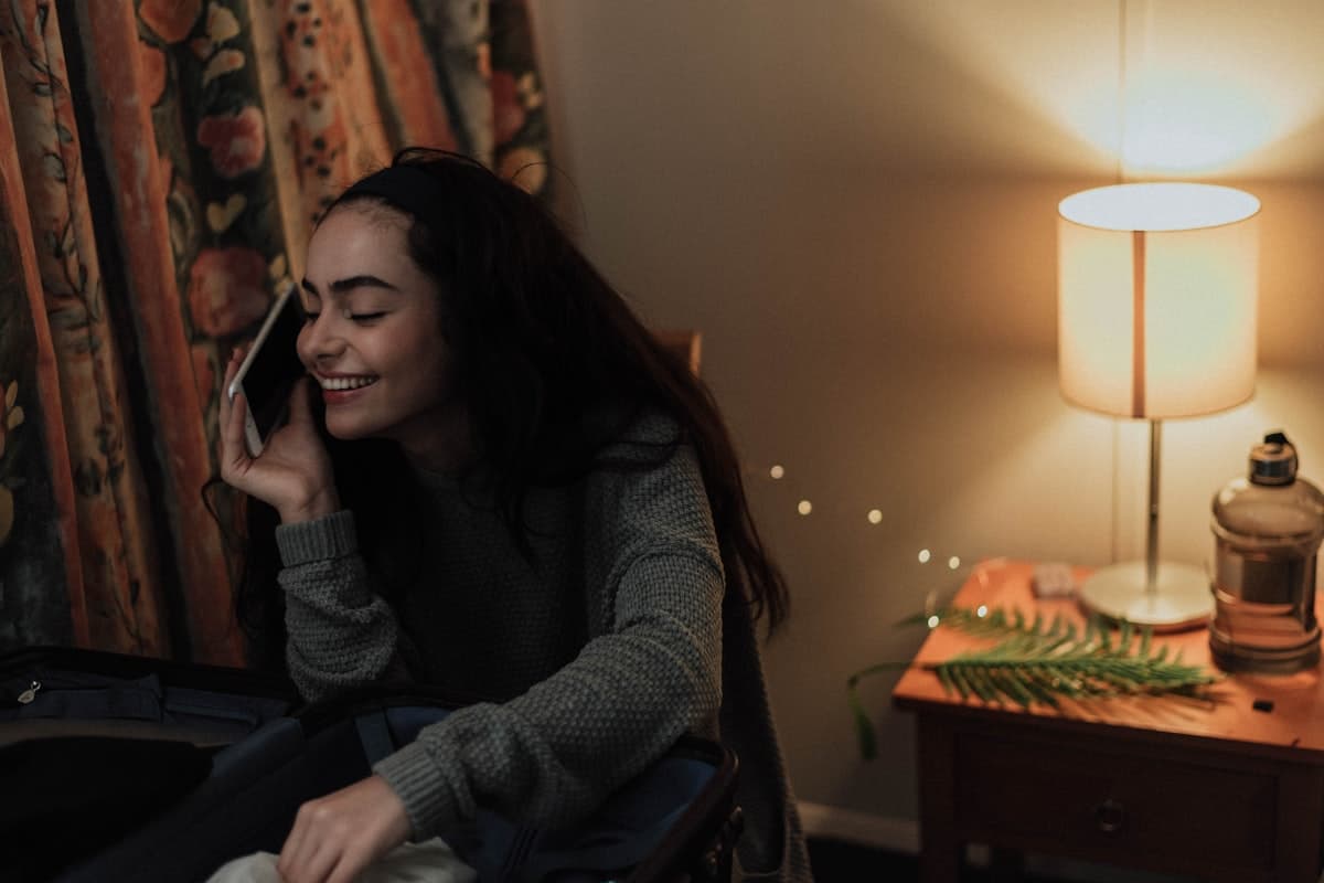 Woman using her smartphone calmly — what checking your finances should feel like